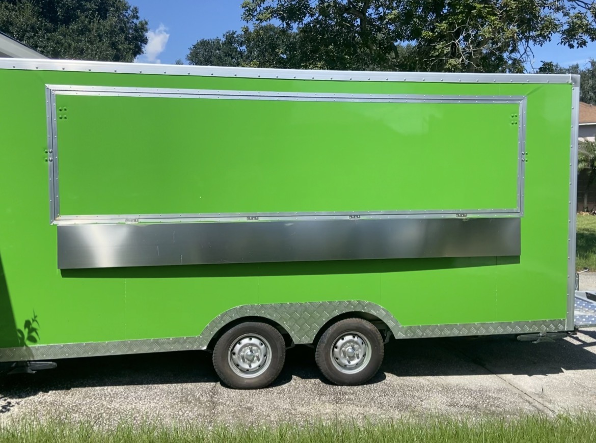 The finished green food trailer assembled and ready in Florida