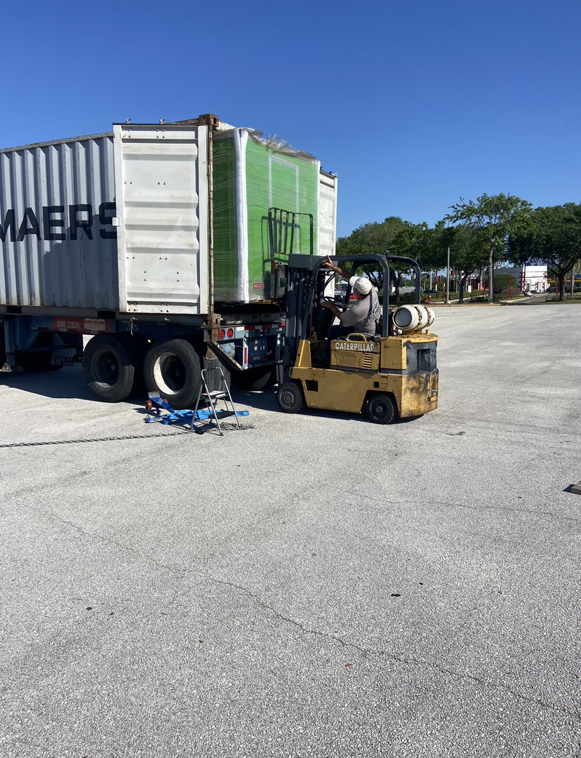 My trailer arriving wrapped on a pallet off a Maersk container in Florida